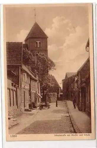 57177 Ak Lübz Schulstrasse mit Kirche und Schule 1928