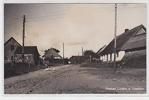 61424 Foto Ak Seebad Loddin auf Usedom Strassenansicht 1936