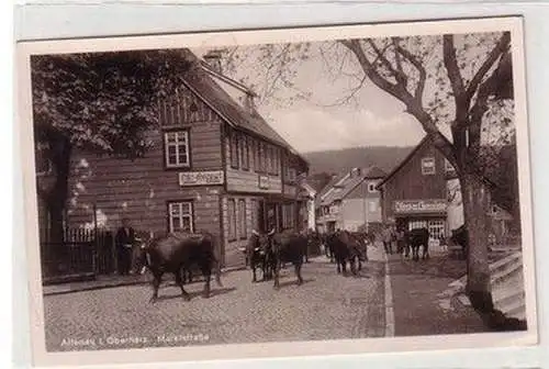 49553 Ak Altenau im Oberharz Marktstrasse mit Kuhherde um 1930