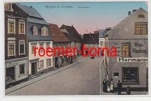 73291 Ak Mügeln bei Oschatz Altmarkt mit Weinhandlung um 1910