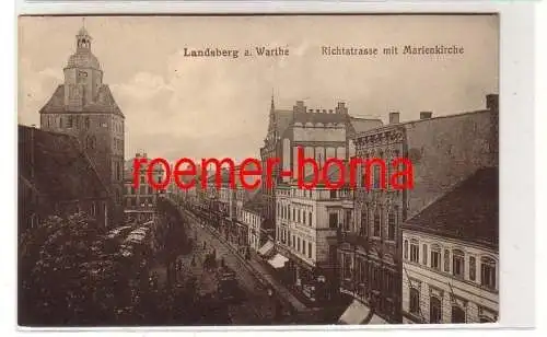 80630 Ak Landsberg a. Warthe Richtstraße mit Marienkirche um 1910