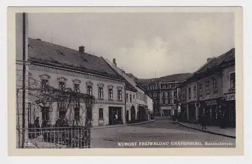 09469 Ak Kurort Freiwaldau Gräfenberg Bahnhofstraße um 1910