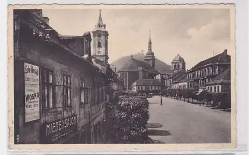 90701 AK Brüx Mosten - Marktplatz mit Miedersalon, Lehranstalt und Kirche