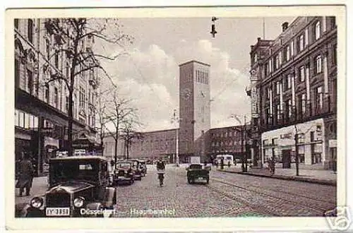 03404 Ak Düsseldorf Hauptbahnhof mit Verkehr 1940