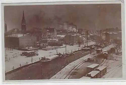 61768 Ak Elmshorn Teilansicht mit Bahnanlagen im Winter um 1920