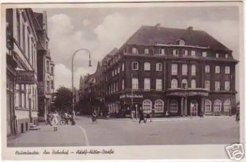 15173 Ak Neumünster am Bahnhof mit Frisör 1942