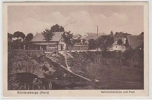 59930 Ak Güntersberge (Harz) Bahnhofsbrücke und Post um 1930