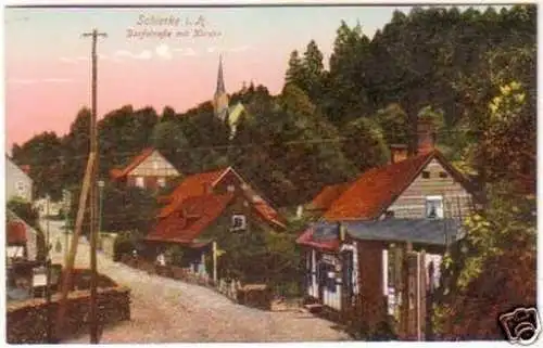 19639 Ak Schierke i. Harz Dorfstraße mit Kirche um 1920