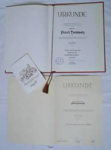 Mappe mit DDR Urkunde Deutsche Post Treuedienstmedaille in Silber 1974