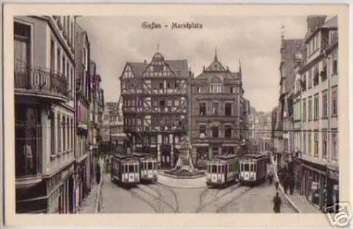 12213 Ak Gießen Marktplatz mit 4 Straßenbahnen um 1920