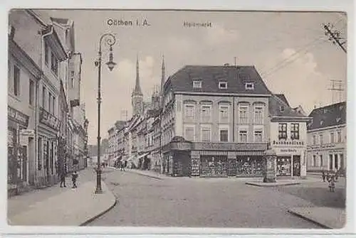 42122 Ak Cöthen Holzmarkt mit Schuhhaus u.a. um 1920