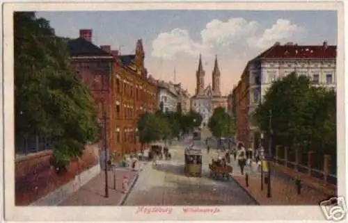 13867 Ak Magdeburg Wilhelmstraße mit Straßenbahn 1921