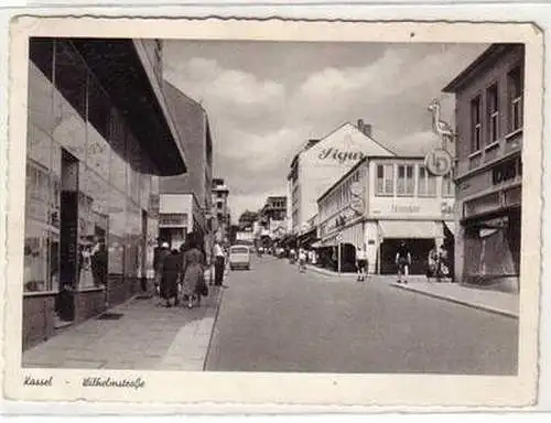 53865 Ak Kassel Wilhelmstrasse mit Geschäften 1954