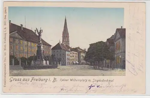 70299 Ak Gruß aus Freiburg i.B. Kaiser Wilhelmplatz mit Siegesdenkmal 1901