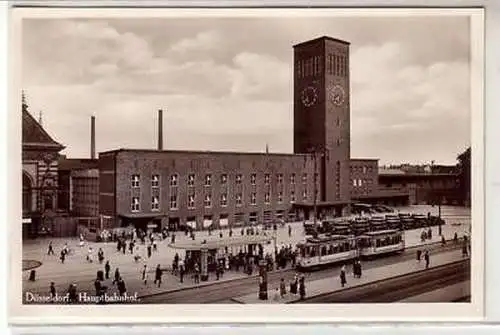 43692 Ak Düsseldorf Hauptbahnhof mit Straßenbahn 1933