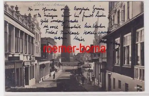 85220 Foto Ak Nordseebad Borkum Straße zum Leuchtturm 1927