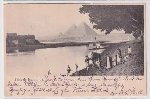 36107 AK Ägypten Ghizeh Pyramids Pyramiden Menschen mit Dromedar am Nil um 1910