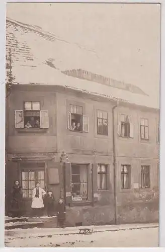 36416 Foto Ak Heidenau bei Pirna Eckgeschäft um 1920