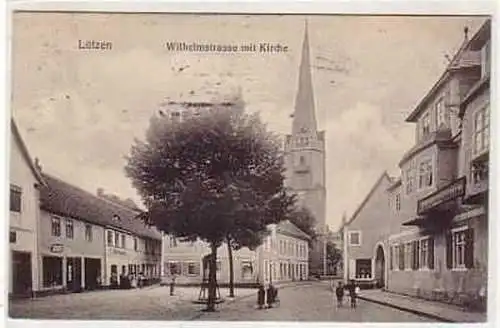 38211 Ak Lützen Wilhelmstraße mit Kirche 1912