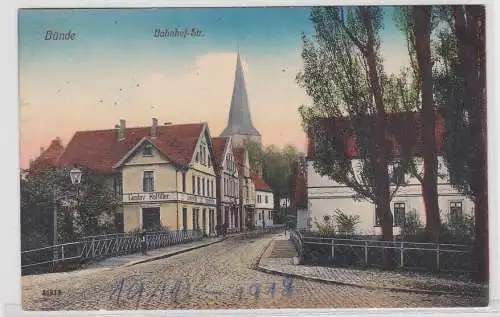 19709 Ak Bünde, Straßenansicht Bahnhof-Str., Gustav Hoffilter, Kirche, um 1910