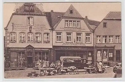 64078 Ak Häuser mit Bekenntnissprüchen am Domplatz von St. Wendel um 1930