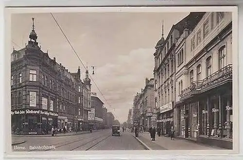 56333 Ak Herne Bahnhofstrasse mit Geschäften 1937