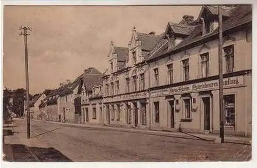 57298 Ak Gruß aus Niesky Görlitzerstrasse mit Geschäften um 1910