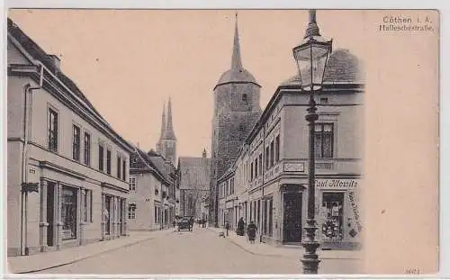 91695 Ak Cöthen Köthen in Anhalt Hallesches Straße mit Geschäften um 1900