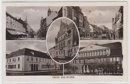70342 Mehrbild Ak Gruß aus Hilden Stadt Sparkasse, Ober Realschule usw. 1940