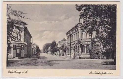 93805 Ak Osterburg Bahnhofstraße mit Geschäften 1942