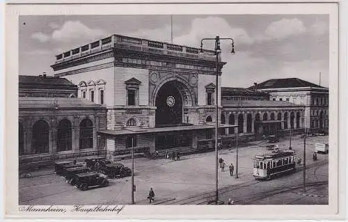 66358 Ak Mannheim Hauptbahnhof mit Straßenbahn davor um 1940