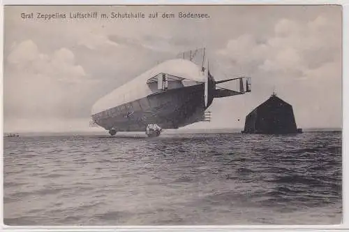 64778 Ak Graf Zeppelins Luftschiff m. Schutzhalle auf dem Bodensee 1909