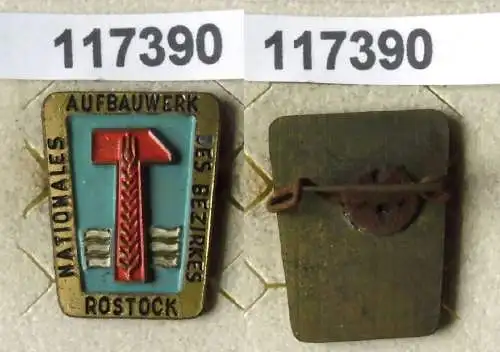 lackierte DDR Aufbaunadel Rostock in Gold (117390)