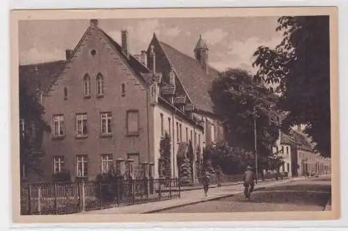 52424 Ak Delitzsch Bürgerhospital und Kirche um 1920