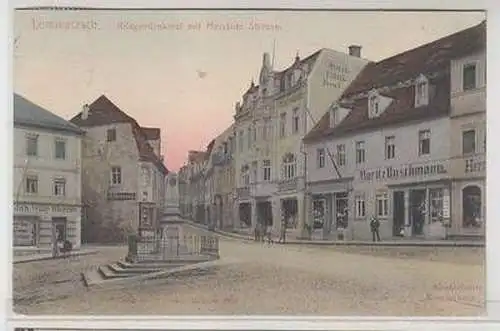 57871 Ak Lommatzsch Kriegerdenkmal m. Meissner Strasse, Biscuit-Fabrik u.a. 1911