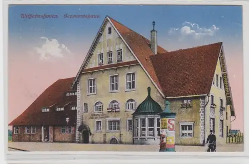 70570 Ak Wilhelmshaven Seemannshaus mit Litfasssäule davor 1921