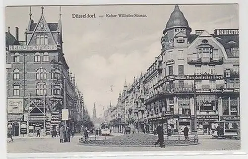 64100 Ak Düsseldorf Kaiser-Wilhelm-Strasse mit Geschäften um 1920