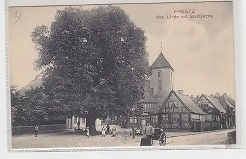 65227 Ak Preetz in Holstein alte Linde mit Stadtkirche um 1910