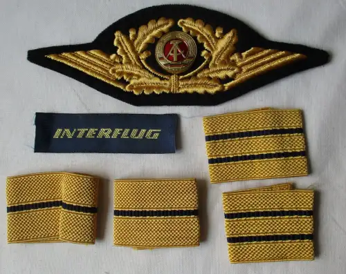 Konvolut zivile Luftfahrt DDR Interflug Aufnäher Schlaufen Mützenemblem (135833)