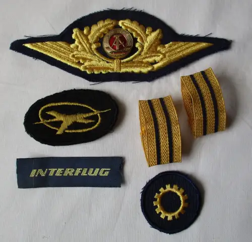 Konvolut zivile Luftfahrt DDR Interflug Aufnäher Schlaufen Mützenemblem (134103)