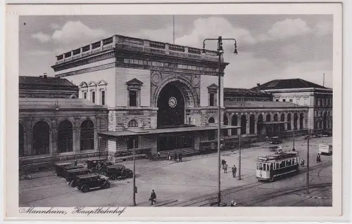 66358 Ak Mannheim Hauptbahnhof mit Straßenbahn davor um 1940