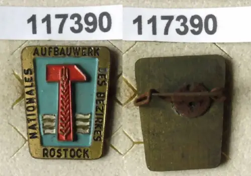 lackierte DDR Aufbaunadel Rostock in Gold (117390)