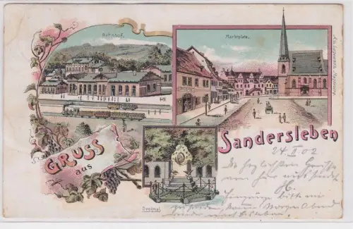 902564 Ak Lithographie Gruß aus Sandersleben Bahnhof, Denkmal usw. 1902 