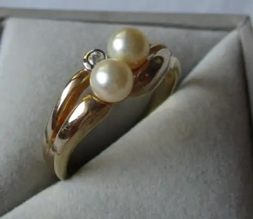eleganter 333er Gold Ring mit 2 Perlen und farblosem Edelstein (135321)
