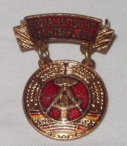 DDR Abzeichen sozialistische Rechtspflege in Bronze