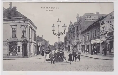 93338 Ak Wittenberge an der Elbe am Stern mit Geschäften um 1910