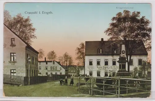 49030 AK Cranzahl im Erzgebirge - Kriegerdenkmal & Geschäfte, Bahnpost 1918
