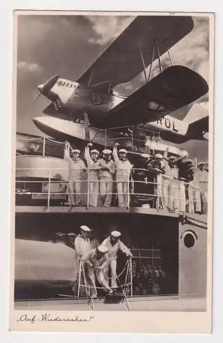 67595 Ak "Auf Wiedersehen" Wasserflugzeug beim Transport mit dem Schiff 1937