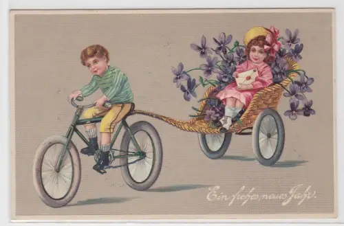 29221 Präge AK Ein frohes neues Jahr Fahrradfahrer mit Anhänger und Kind 1912