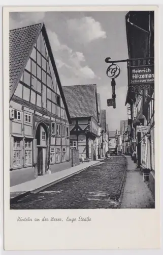 902974 Ak Rinteln an der Weser Enge Strasse mit Schlosserei um 1940